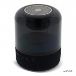 Altavoz bluetooth negro pequeño portátil en forma circular color negro